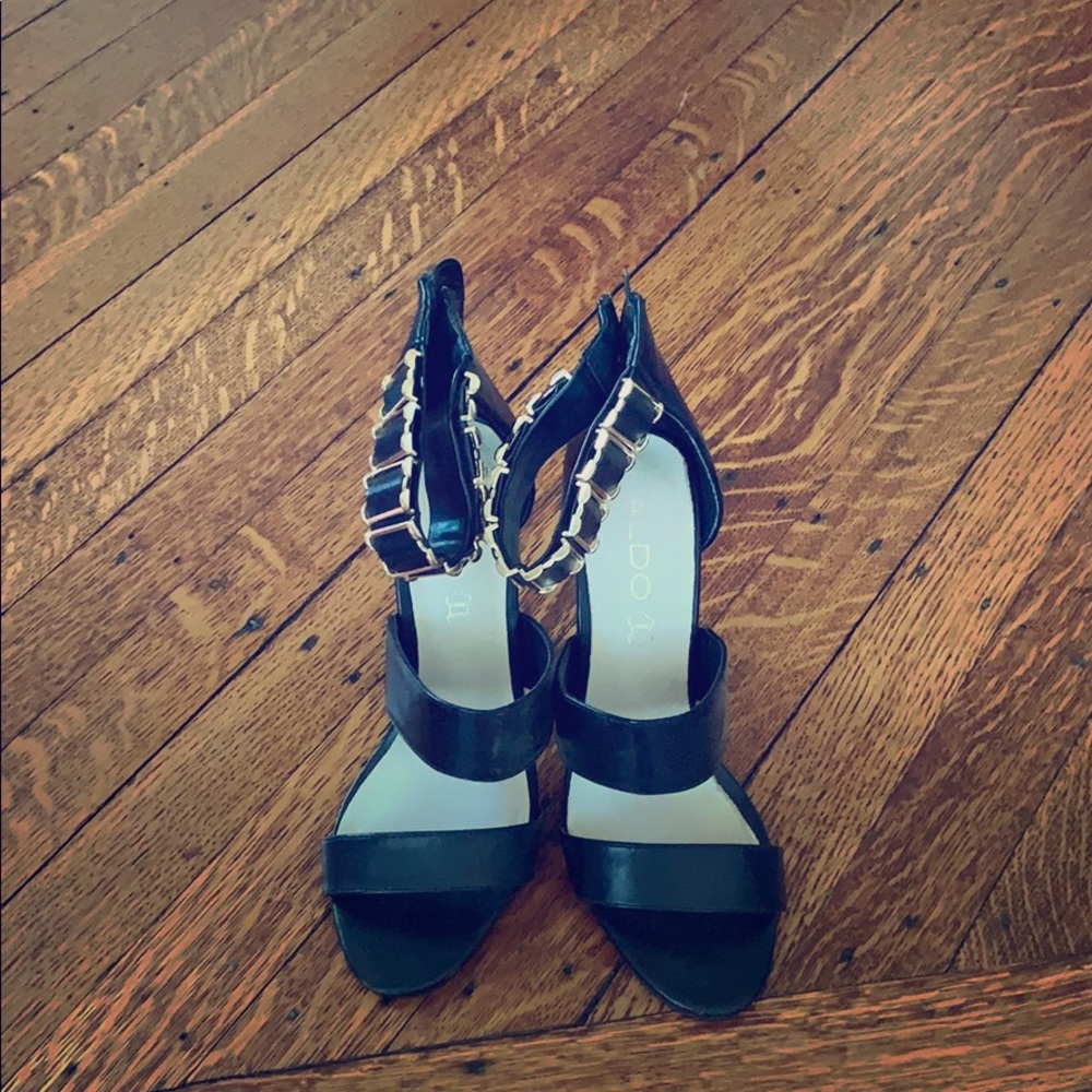 ALDO black heels with golden ankle design